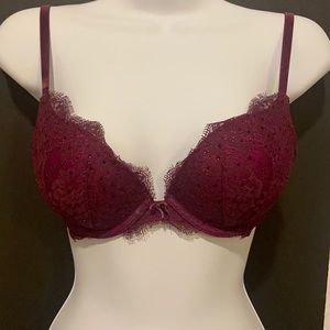 Elegant padded jewels on laced bra with velvet straps . Color is red wine